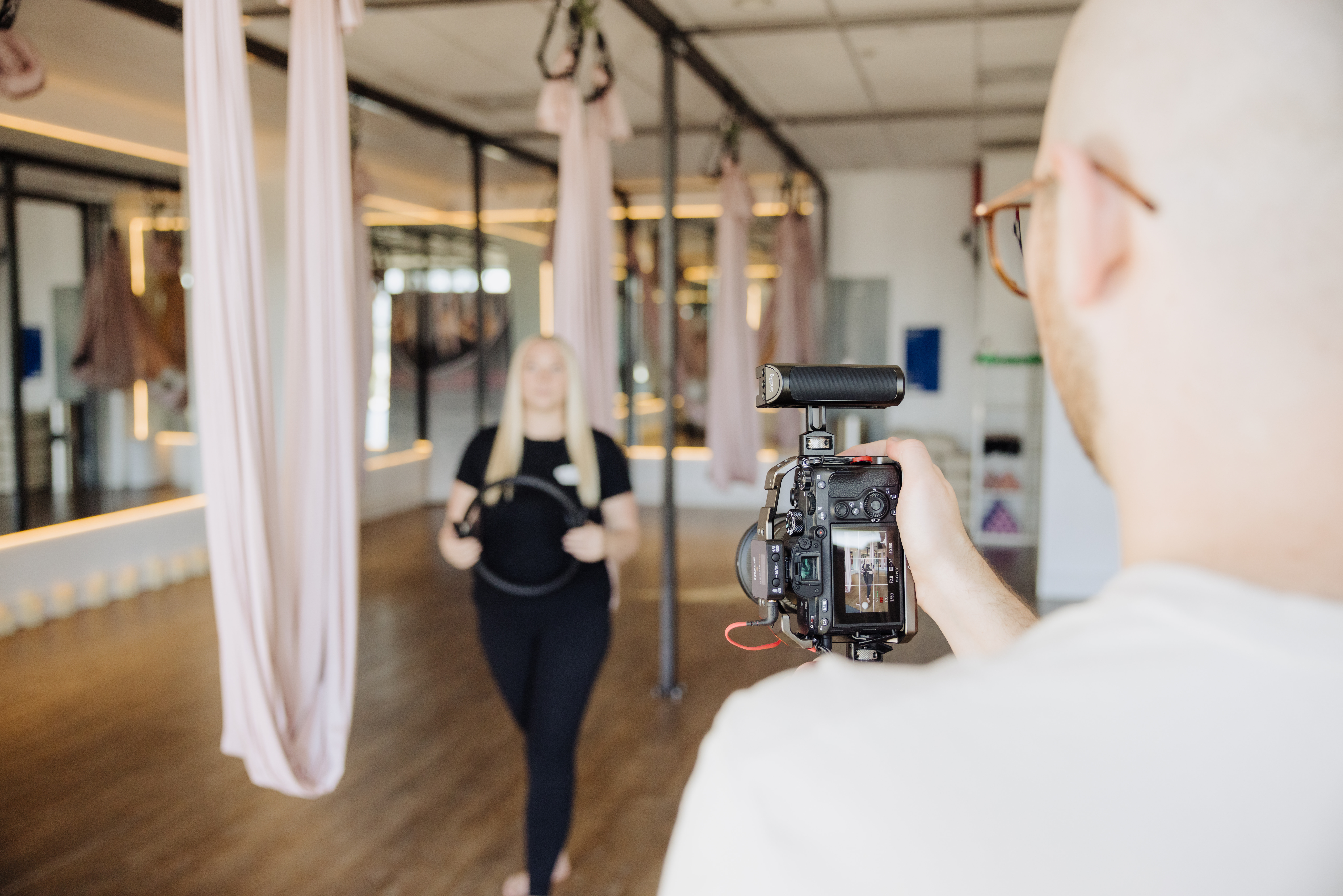 Taylor's aerial yoga studio during an on-location shoot