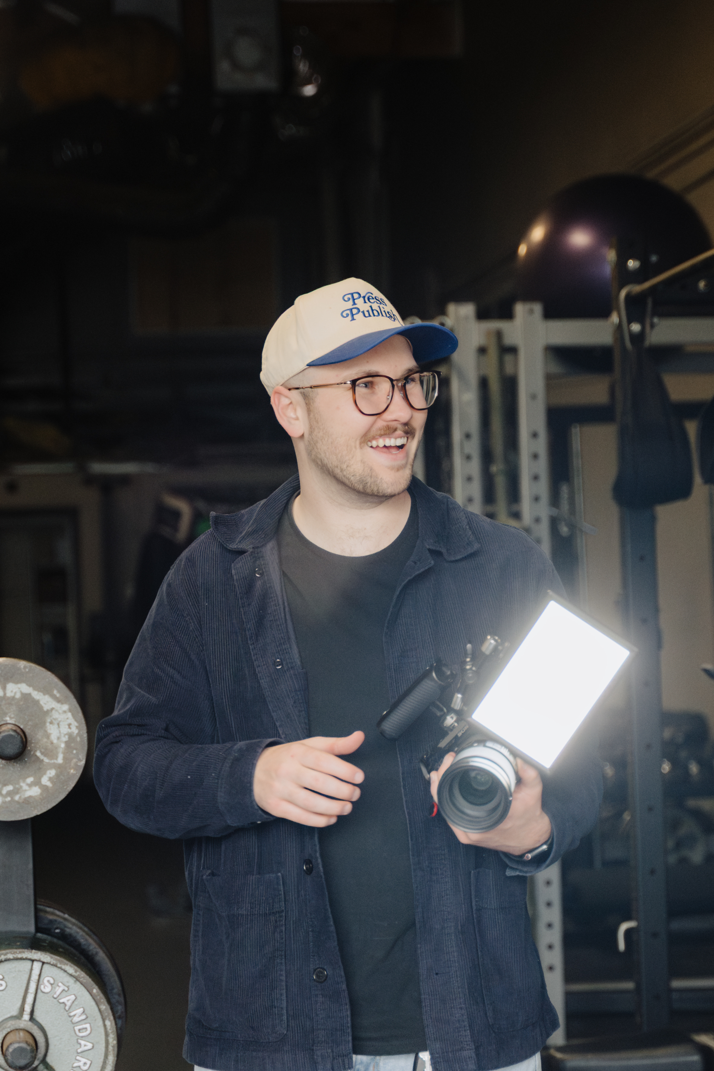 Joel O'Brien on location, shooting a founder-led ad at a gym